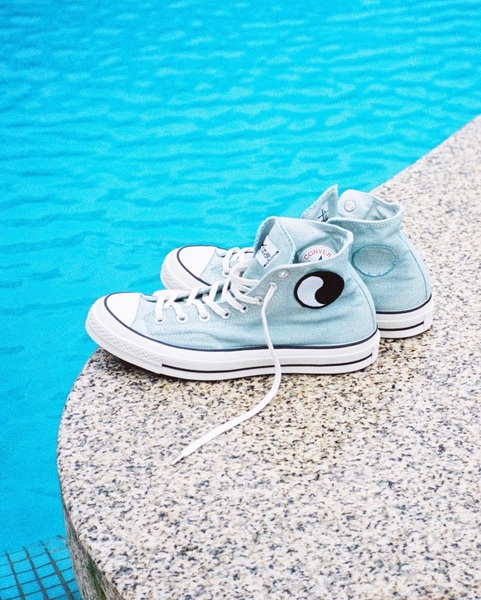 The Converse Chuck 70 Hi by Stussy in Baby Blue are Decorated with the